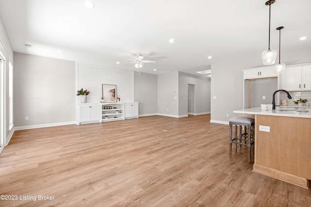 801 Artisan Pkwy, La Grange, KY 40031 - living room with ceiling fan, recessed lighting, light wood-style floors, and baseboards