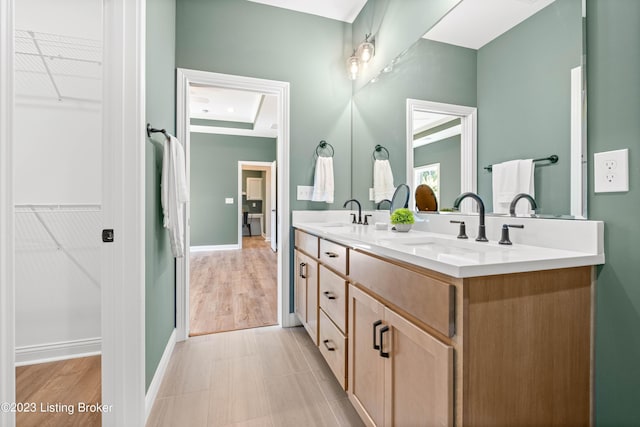 801 Artisan Pkwy, La Grange, KY 40031 - full bath featuring a walk in closet, double vanity, and baseboards
