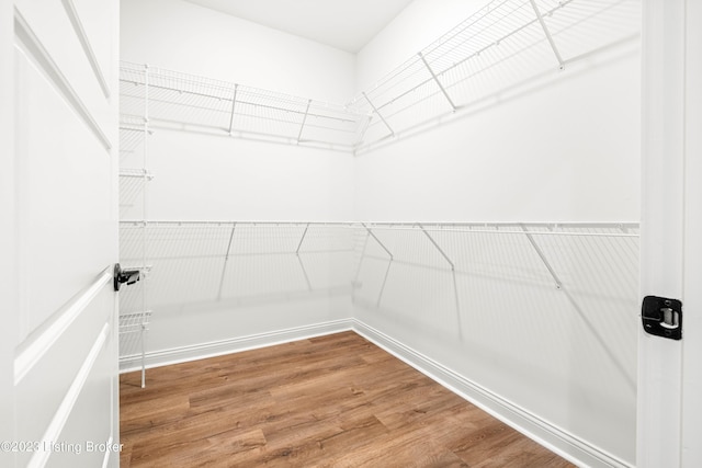 801 Artisan Pkwy, La Grange, KY 40031 - spacious closet featuring wood finished floors