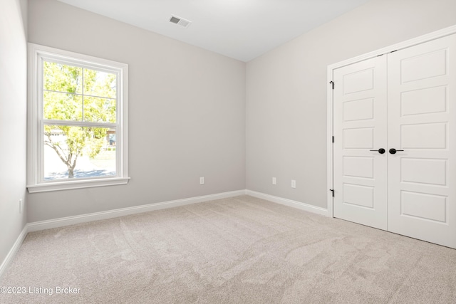 801 Artisan Pkwy, La Grange, KY 40031 - unfurnished bedroom with carpet floors, baseboards, and a closet