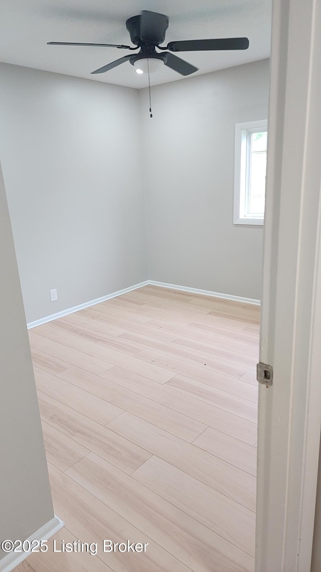 3505 Regatta Way, Louisville, KY 40211 - spare room with a ceiling fan, baseboards, and light wood-type flooring