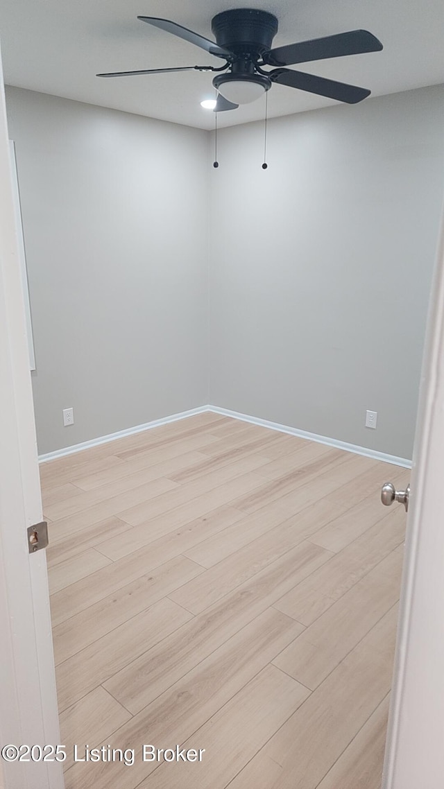 3505 Regatta Way, Louisville, KY 40211 - unfurnished room with a ceiling fan, light wood finished floors, and baseboards