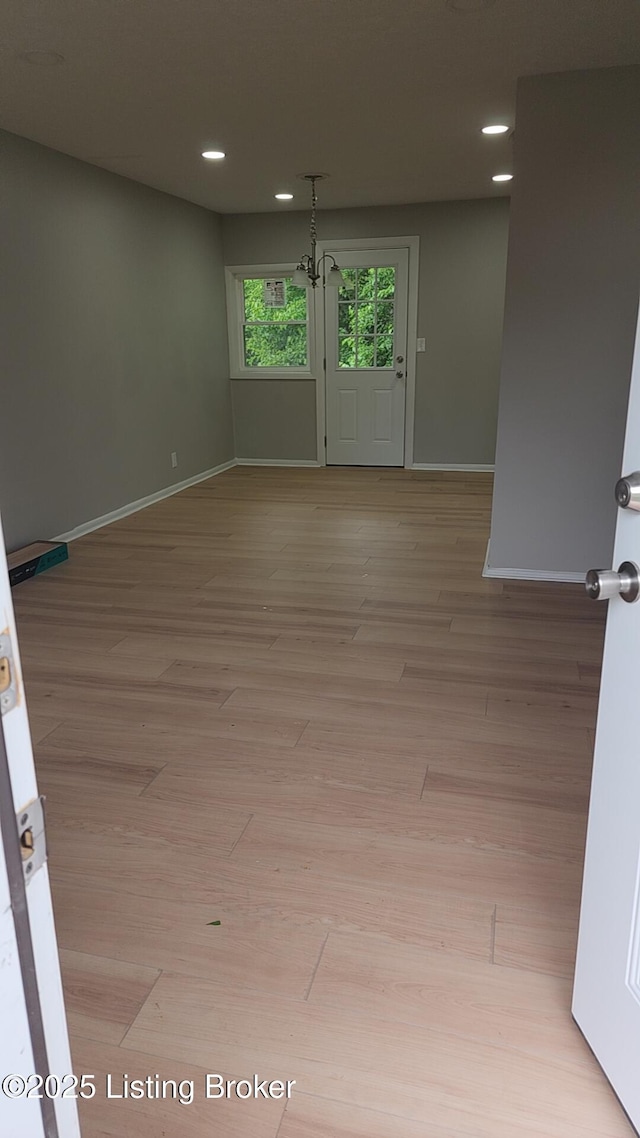 3505 Regatta Way, Louisville, KY 40211 - unfurnished room featuring recessed lighting, light wood finished floors, and baseboards