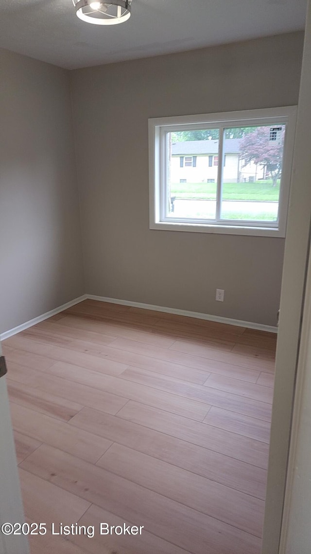 3505 Regatta Way, Louisville, KY 40211 - spare room featuring light wood finished floors and baseboards