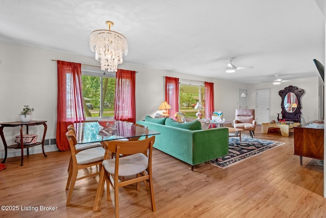 607 Edgemont Rd, Irvington, KY 40146 - living area with plenty of natural light, a chandelier, ceiling fan, and light wood-style floors