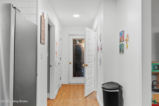 607 Edgemont Rd, Irvington, KY 40146 - hall featuring light wood-style flooring, baseboards, and recessed lighting