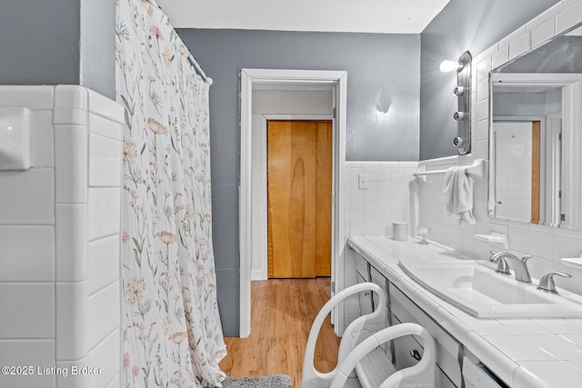607 Edgemont Rd, Irvington, KY 40146 - bathroom with vanity, wood finished floors, and a shower with curtain