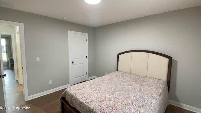 122 Iroquois Trl, Bloomfield, KY 40008 - bedroom with dark wood-type flooring and baseboards