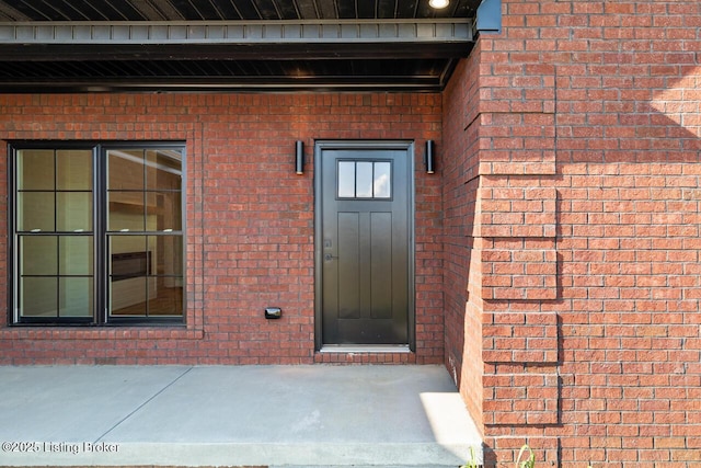 506 Capps Rd, Campbellsville, KY 42718 - view of exterior entry featuring brick siding