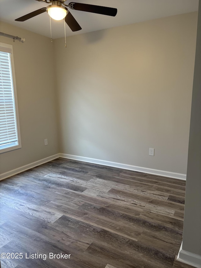 7997 Pikewood Field Way, Louisville, KY 40219 - unfurnished room with a ceiling fan, dark wood-style floors, baseboards, and plenty of natural light
