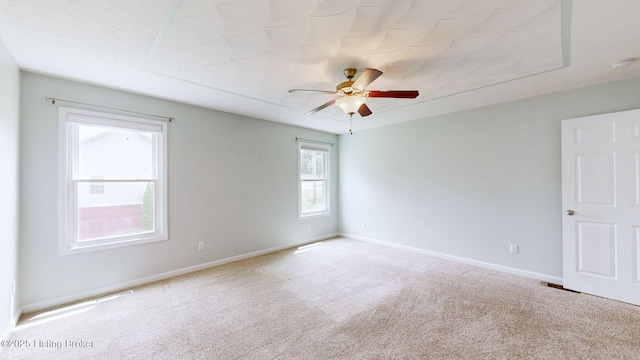 85 Summitt Dr, Brandenburg, KY 40108 - spare room featuring carpet floors, a ceiling fan, and baseboards