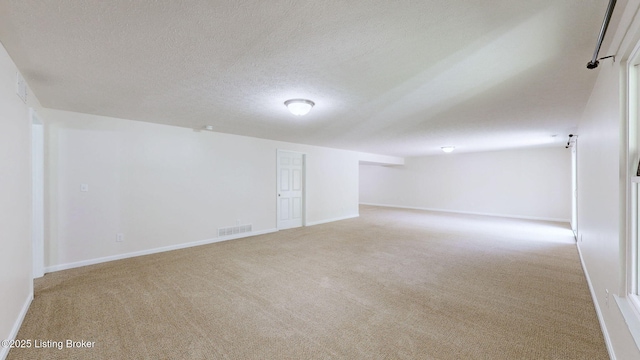 85 Summitt Dr, Brandenburg, KY 40108 - spare room with carpet flooring, baseboards, and a textured ceiling