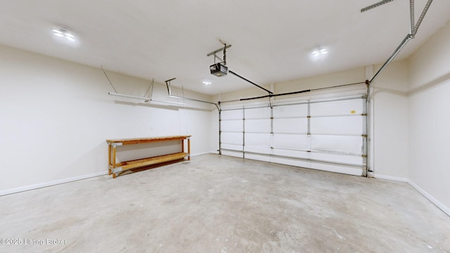85 Summitt Dr, Brandenburg, KY 40108 - garage featuring a garage door opener and baseboards