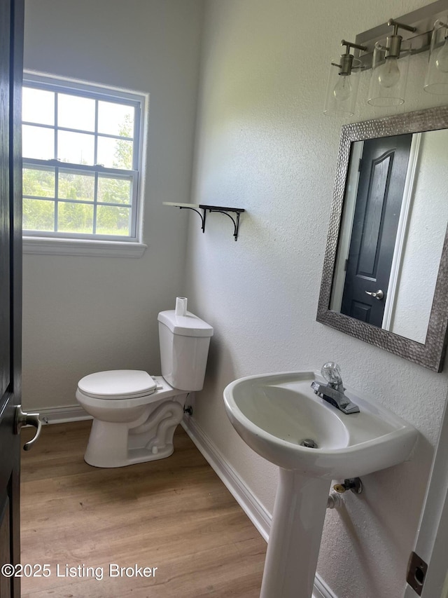 75 Labrador Way, Rineyville, KY 40162 - bathroom with toilet, wood finished floors, and baseboards