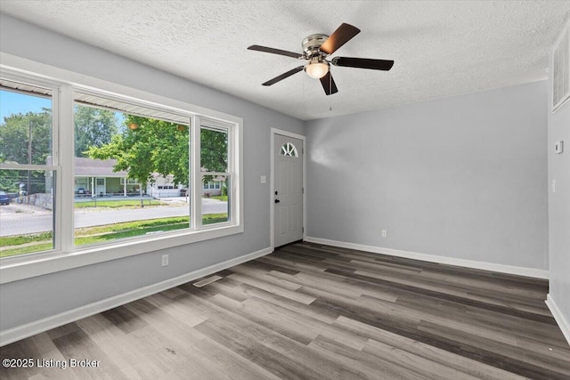 404 Diecks Dr, Elizabethtown, KY 42701 - unfurnished room featuring wood finished floors, baseboards, ceiling fan, and a textured ceiling