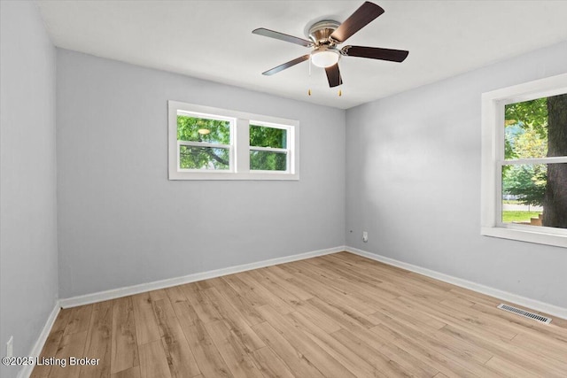 404 Diecks Dr, Elizabethtown, KY 42701 - empty room featuring healthy amount of natural light, light wood finished floors, ceiling fan, and baseboards