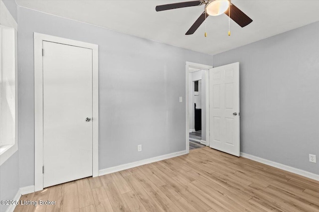404 Diecks Dr, Elizabethtown, KY 42701 - unfurnished bedroom featuring light wood finished floors, baseboards, and ceiling fan