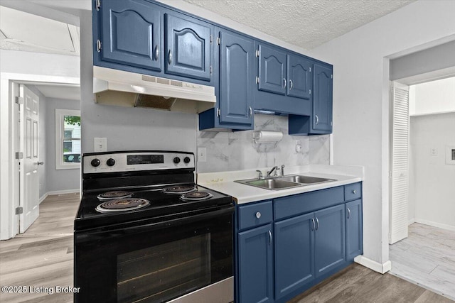 404 Diecks Dr, Elizabethtown, KY 42701 - kitchen featuring black / electric stove, under cabinet range hood, blue cabinetry, a sink, and light wood-type flooring