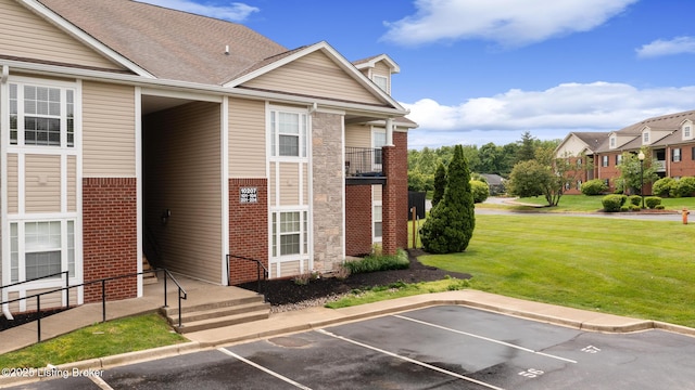 10207 Deer Vista Dr Unit 204, Louisville, KY 40291 - view of building exterior with uncovered parking