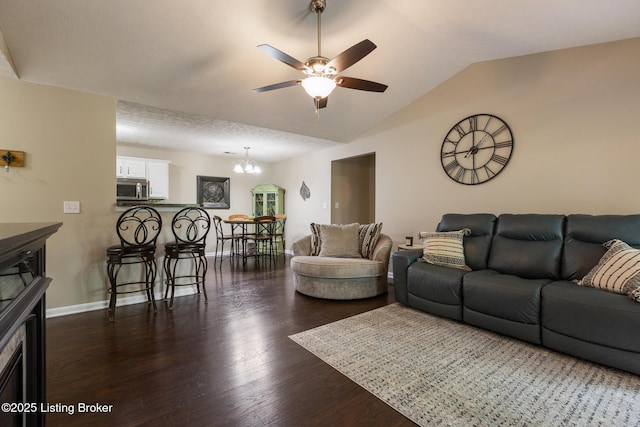 10207 Deer Vista Dr Unit 204, Louisville, KY 40291 - living area featuring vaulted ceiling, a chandelier, ceiling fan, dark wood-style flooring, and baseboards