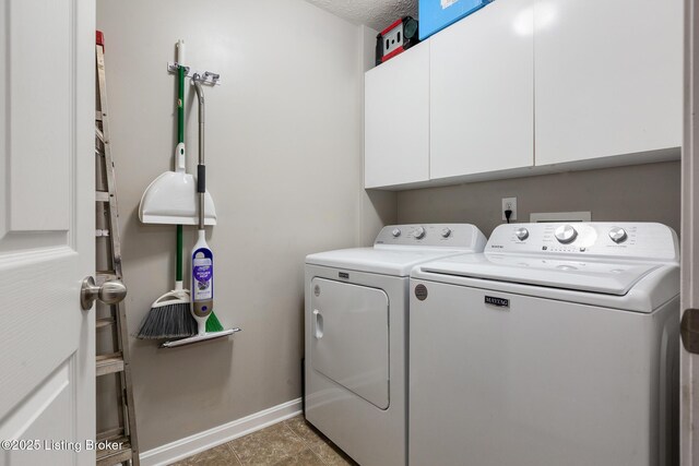 10207 Deer Vista Dr Unit 204, Louisville, KY 40291 - laundry room featuring washer and clothes dryer, cabinet space, and baseboards