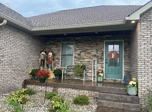 107 Clymene Rd, Cecilia, KY 42724 - property entrance featuring brick siding