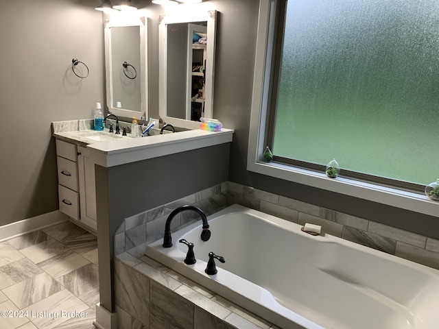 107 Clymene Rd, Cecilia, KY 42724 - full bathroom featuring a bath, vanity, and baseboards