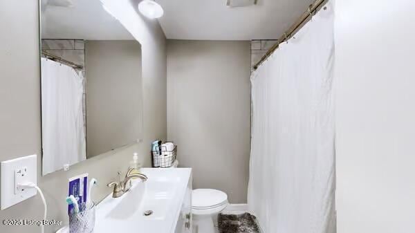 10003 Larlyn Dr, Fairdale, KY 40118 - bathroom featuring vanity and toilet