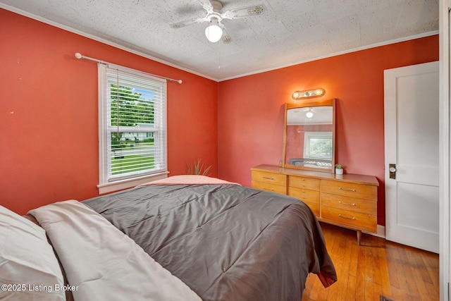4309 Cavelle Ave, Louisville, KY 40213 - bedroom featuring wood-type flooring, crown molding, and ceiling fan
