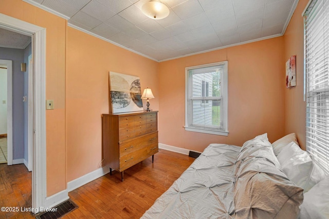 4309 Cavelle Ave, Louisville, KY 40213 - bedroom featuring ornamental molding, hardwood / wood-style floors, and baseboards
