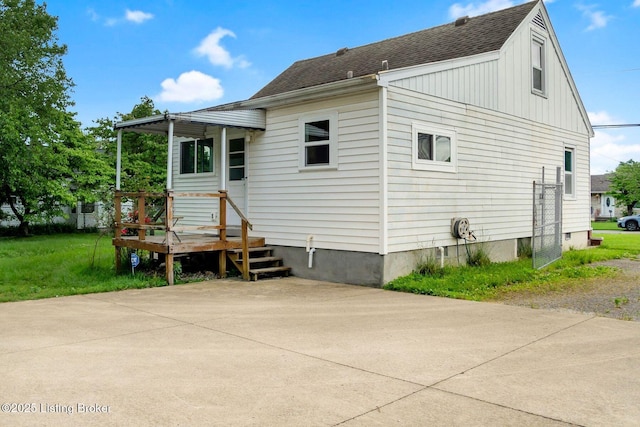 4309 Cavelle Ave, Louisville, KY 40213 - back of property featuring board and batten siding and a shingled roof