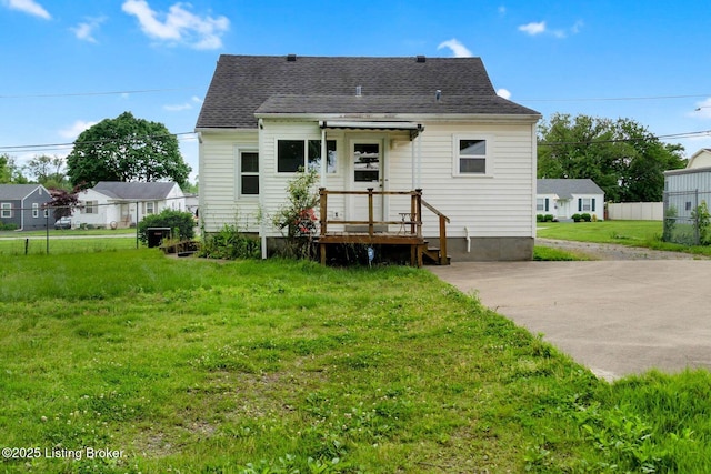 4309 Cavelle Ave, Louisville, KY 40213 - back of house featuring a shingled roof