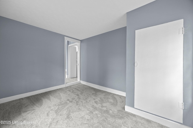 113 Mckay Ave, Bloomfield, KY 40008 - empty room featuring carpet and baseboards
