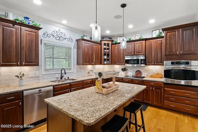 13318 Stepping Stone Way, Louisville, KY 40299 - kitchen featuring stainless steel appliances, a sink, a breakfast bar area, a center island, and tasteful backsplash