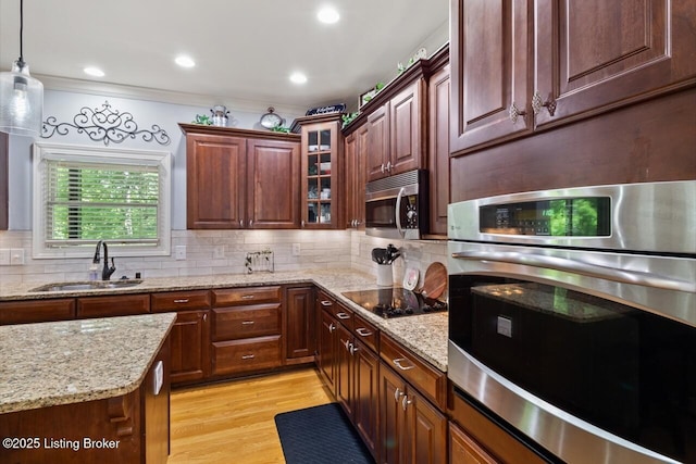 13318 Stepping Stone Way, Louisville, KY 40299 - kitchen featuring a sink, stainless steel appliances, backsplash, glass insert cabinets, and light wood-type flooring
