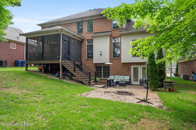 13318 Stepping Stone Way, Louisville, KY 40299 - back of house featuring an outdoor hangout area, a sunroom, a yard, and a patio area