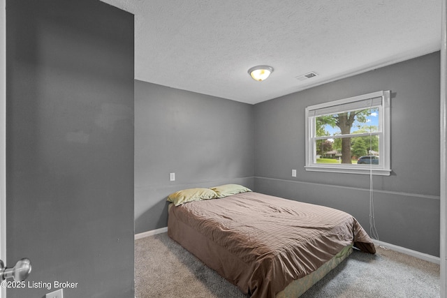 3802 Breckenridge Ln, Louisville, KY 40218 - bedroom featuring carpet, baseboards, and a textured ceiling