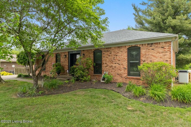12115 Alpine Way, Goshen, KY 40026 - ranch-style house with a front lawn, central air condition unit, and brick siding