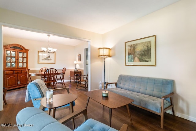 12115 Alpine Way, Goshen, KY 40026 - living area with a chandelier, wood finished floors, and baseboards