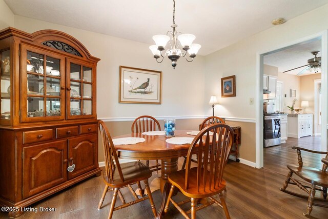 12115 Alpine Way, Goshen, KY 40026 - dining room with a chandelier and dark wood finished floors