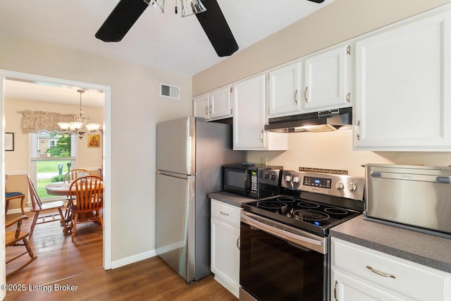 12115 Alpine Way, Goshen, KY 40026 - kitchen with stainless steel appliances, under cabinet range hood, ceiling fan, dark wood-style flooring, and dark countertops