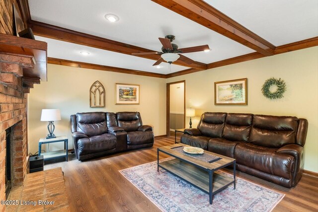 12115 Alpine Way, Goshen, KY 40026 - living area with ceiling fan, wood finished floors, a brick fireplace, ornamental molding, and beam ceiling