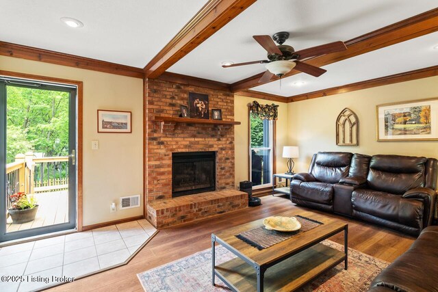 12115 Alpine Way, Goshen, KY 40026 - living area with ceiling fan, wood finished floors, a fireplace, ornamental molding, and baseboards