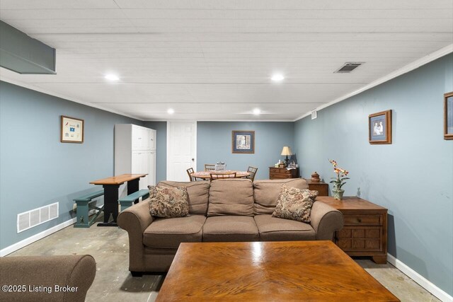 12115 Alpine Way, Goshen, KY 40026 - living area featuring unfinished concrete flooring, recessed lighting, baseboards, and crown molding