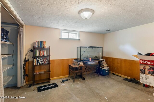 12115 Alpine Way, Goshen, KY 40026 - office featuring a textured ceiling, concrete flooring, wooden walls, and wainscoting