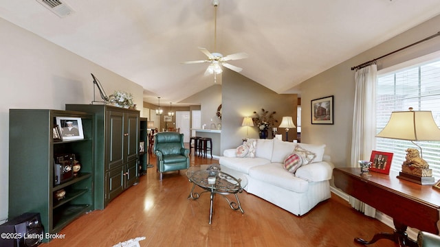 10409 Pine Glen Cir, Louisville, KY 40291 - living room featuring ceiling fan, light wood-style floors, and vaulted ceiling