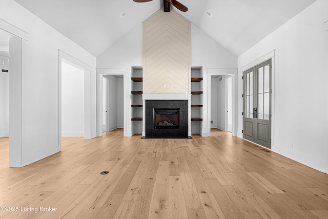 4907 Sycamore Ridge Ln, La Grange, KY 40031 - unfurnished living room featuring ceiling fan, light wood-type flooring, high vaulted ceiling, a tile fireplace, and baseboards