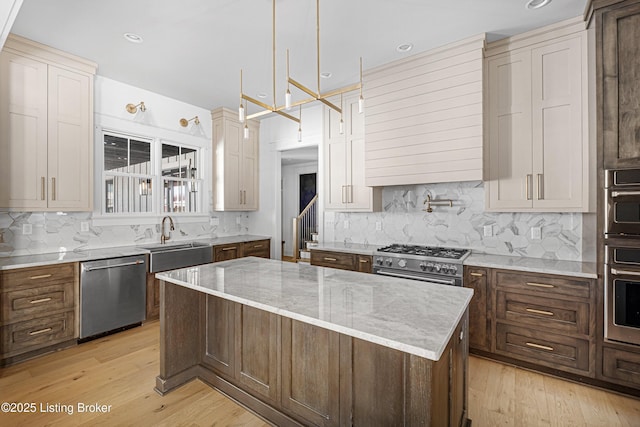 4907 Sycamore Ridge Ln, La Grange, KY 40031 - kitchen with stainless steel appliances, a sink, light wood-type flooring, a center island, and recessed lighting