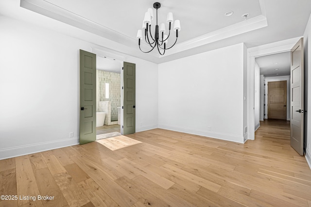 4907 Sycamore Ridge Ln, La Grange, KY 40031 - unfurnished dining area with a chandelier, a raised ceiling, light wood-style flooring, and baseboards