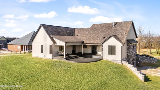 4907 Sycamore Ridge Ln, La Grange, KY 40031 - rear view of house featuring a patio area, board and batten siding, and a shingled roof